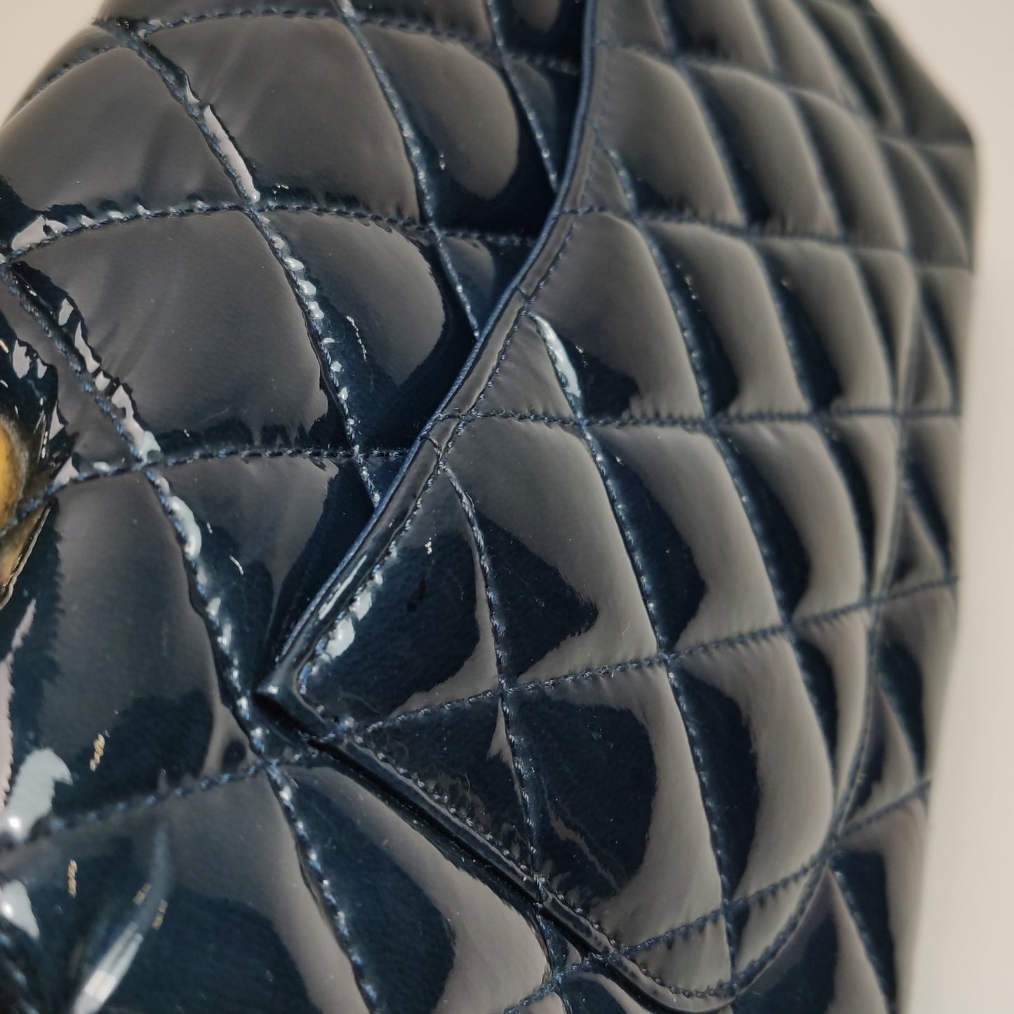 Chanel CC Eyelet Flap Bag Navy Patent